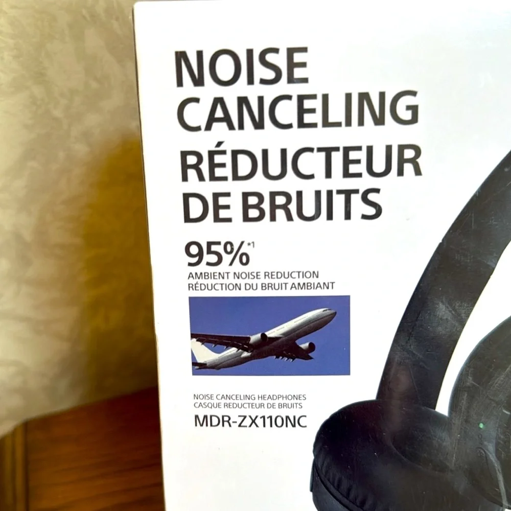Sony Black Noise-Canceling Headphones. 95% ambient noise reduction.